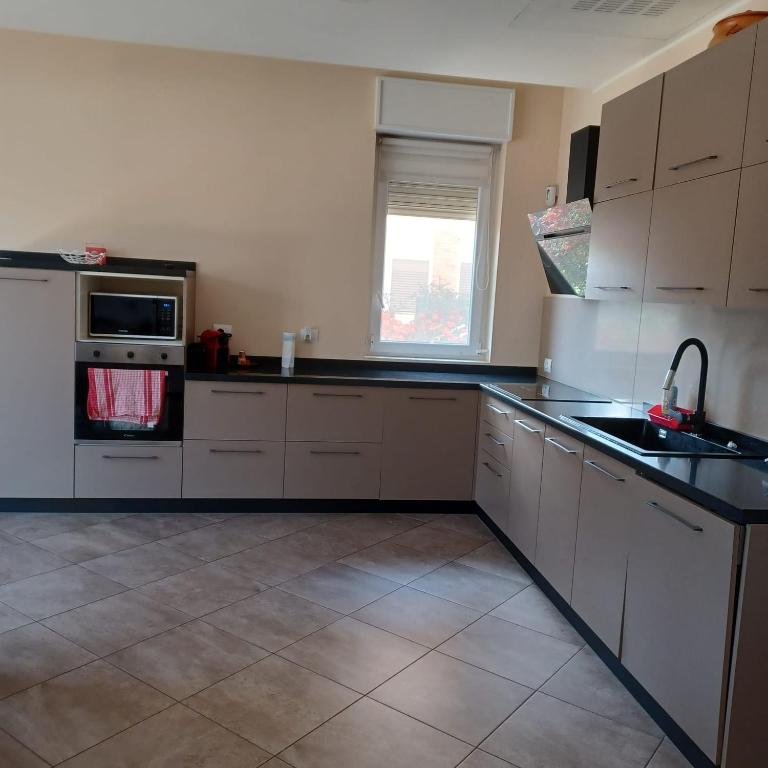 A kitchen or kitchenette at trilocale nr 8