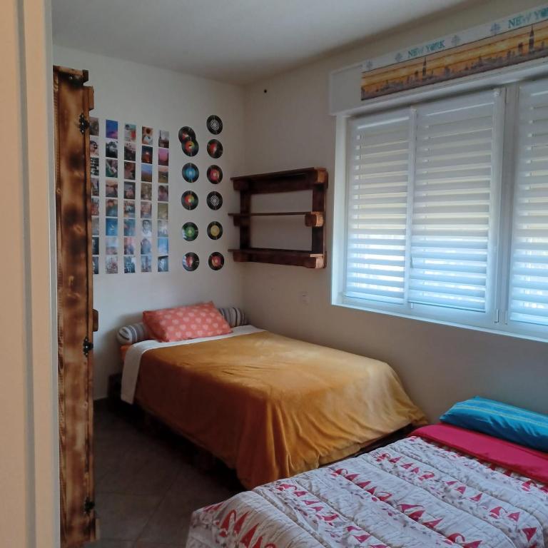 A bed or beds in a room at trilocale nr 8