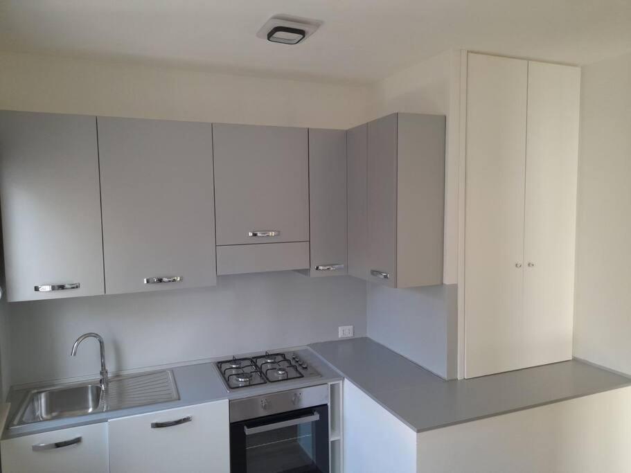 Kuchyň nebo kuchyňský kout v ubytování Casa al Corso Sant'Antioco (SU)