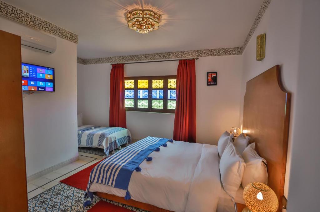 Postel nebo postele na pokoji v ubytování Riad Dari Fes