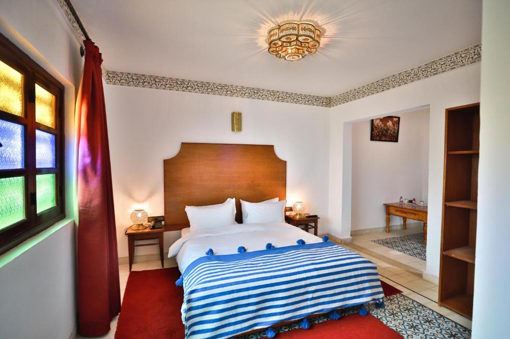 Postel nebo postele na pokoji v ubytování Riad Dari Fes