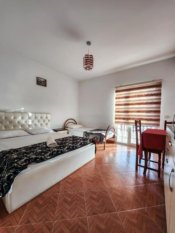 Postel nebo postele na pokoji v ubytování Hotel Fantazia