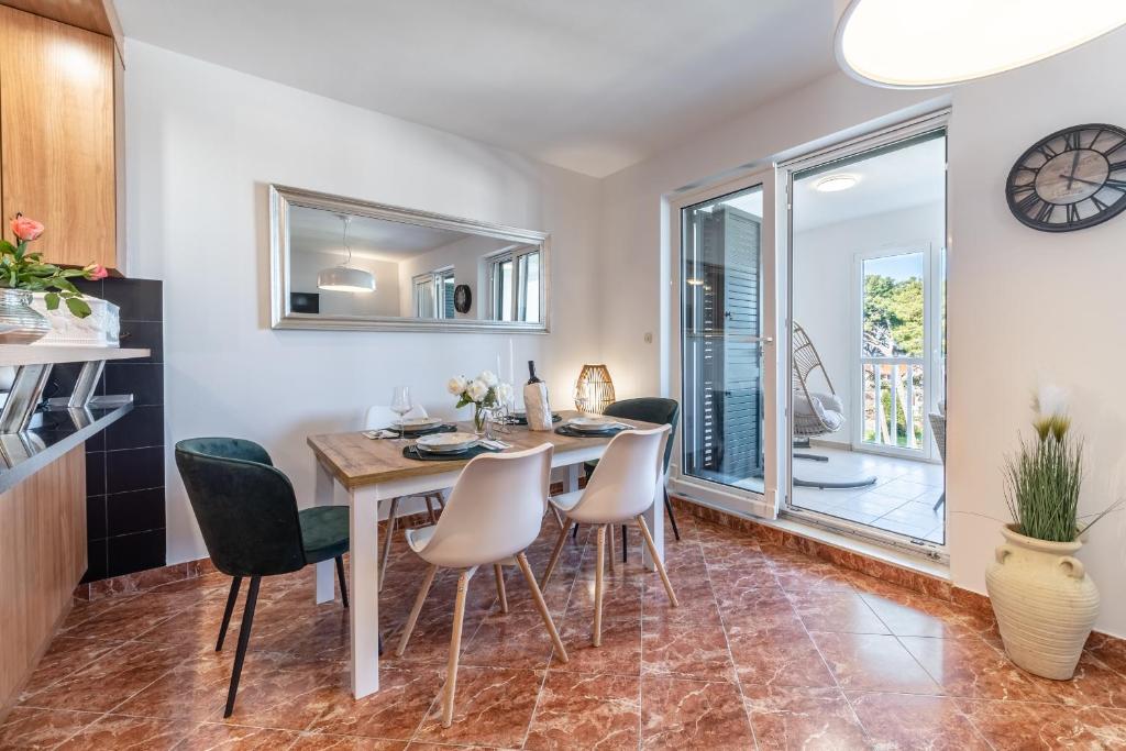 Kuchyň nebo kuchyňský kout v ubytování Apartment Mia