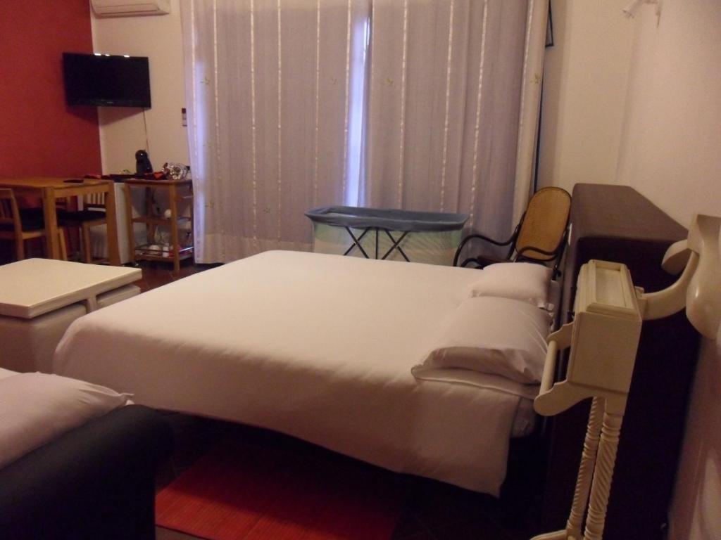 Postel nebo postele na pokoji v ubytování B&B Il Centralino
