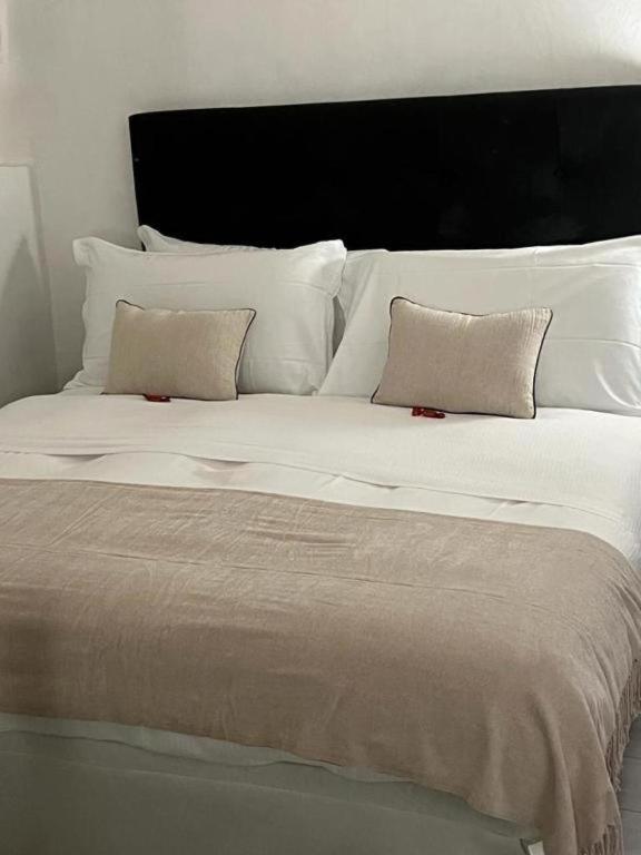 Posteľ alebo postele v izbe v ubytovaní Relax Chiavari House