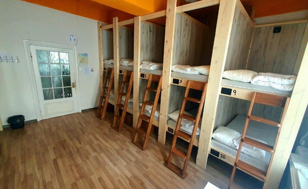 Postel nebo postele na pokoji v ubytování Imaginary Hostel