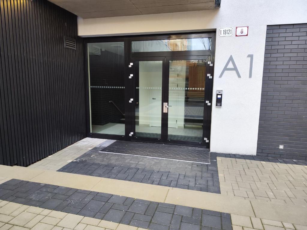 The facade or entrance of Yarn - brand new - free parking - balcony with city view - Central shopping mall