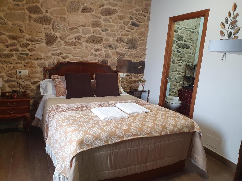 Posteľ alebo postele v izbe v ubytovaní La Pallota de San Cristobal