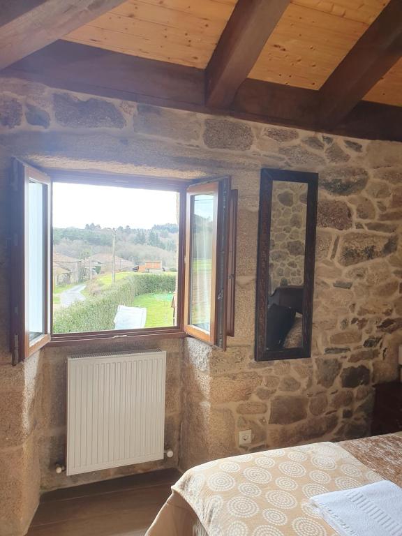 Posteľ alebo postele v izbe v ubytovaní La Pallota de San Cristobal