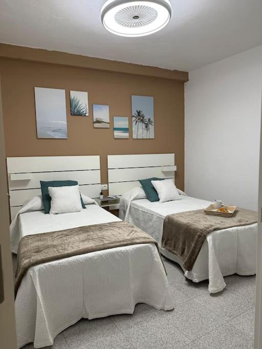 Posteľ alebo postele v izbe v ubytovaní Apartamento SariPedri