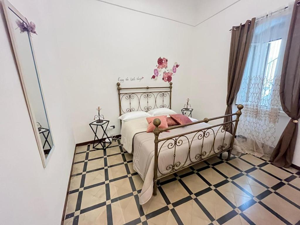 A bed or beds in a room at NicAnto's Home