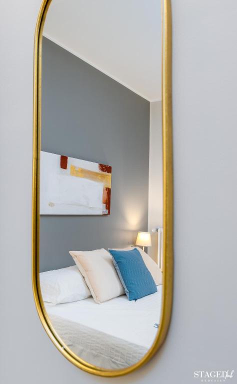 A bed or beds in a room at FEEL - Grand Alta Apartment