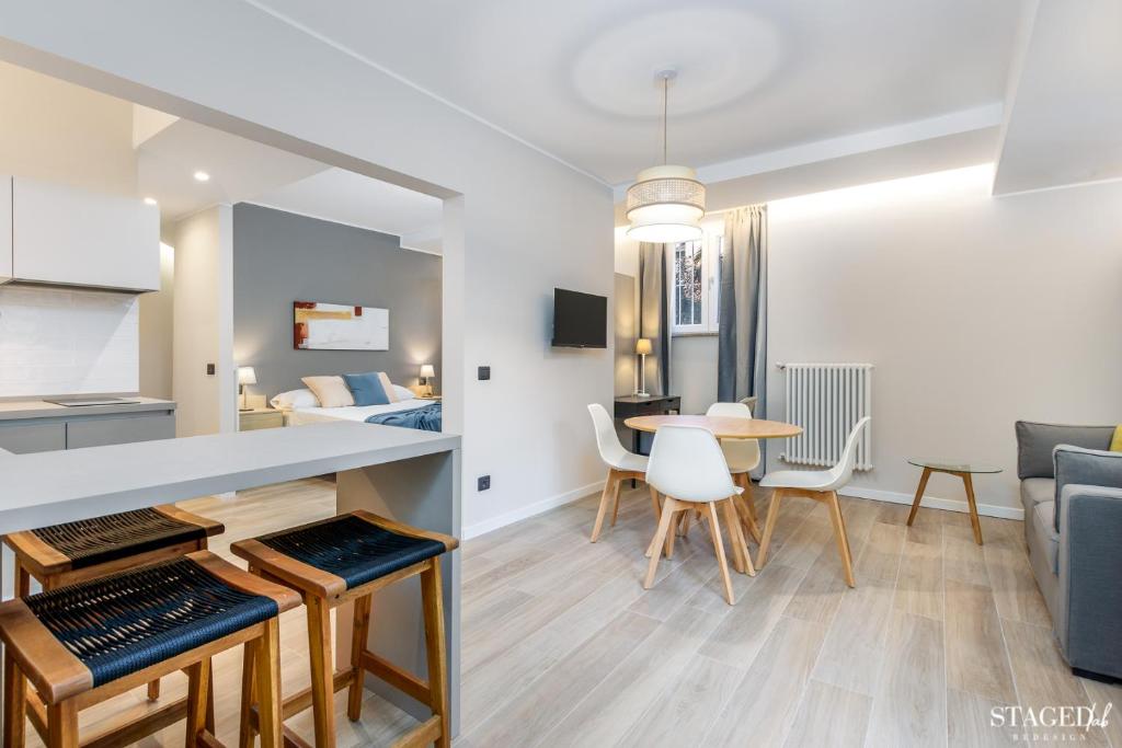 A kitchen or kitchenette at FEEL - Grand Alta Apartment