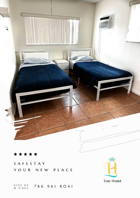 Postel nebo postele na pokoji v ubytování Easy Hostel