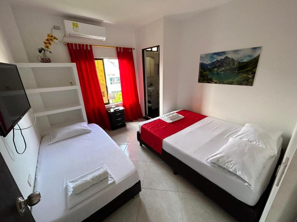 Postel nebo postele na pokoji v ubytování Hotel SG