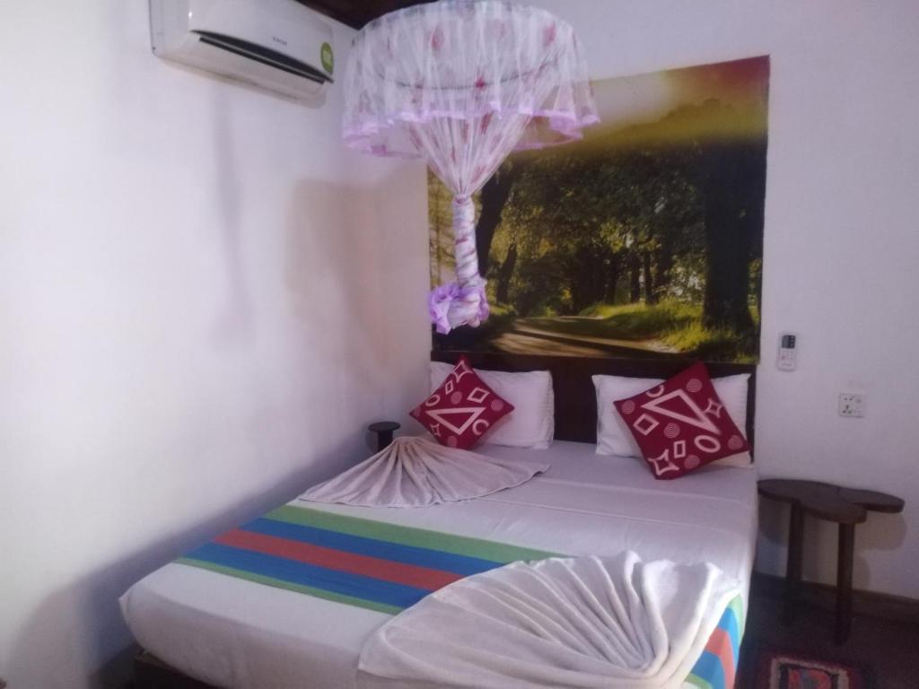 Postel nebo postele na pokoji v ubytování Gangula Eco lodge