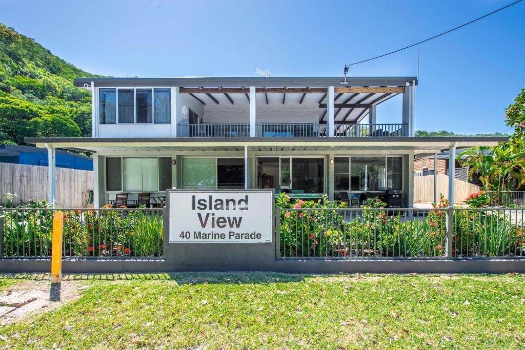 a house with a sign in front of it at Island View Apt 1 in Arcadia
