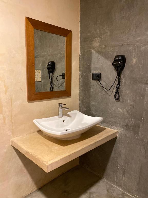 Un baño de Ariché Valladolid Hotel & Hostal