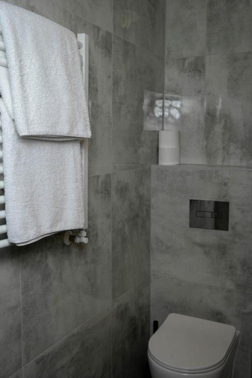 Koupelna v ubytování Hotel George