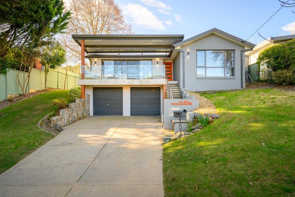 a house with a garage in a yard at 13 Mountbatten in Bright