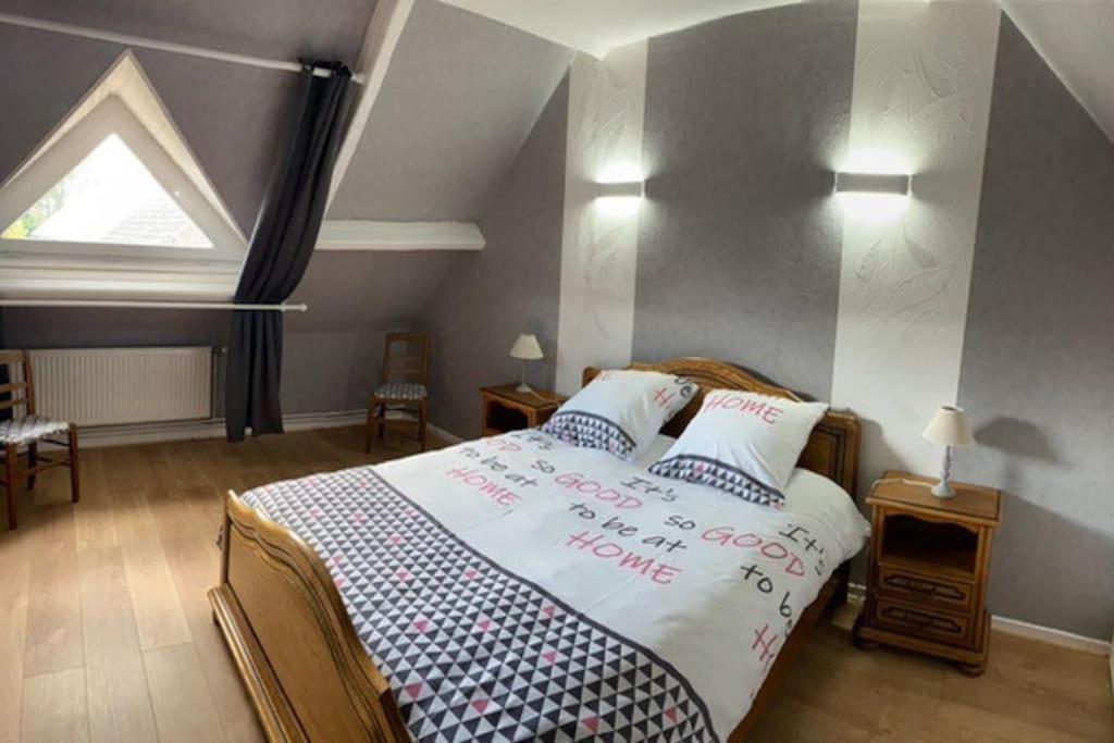Posteľ alebo postele v izbe v ubytovaní Les Poissons Rouges