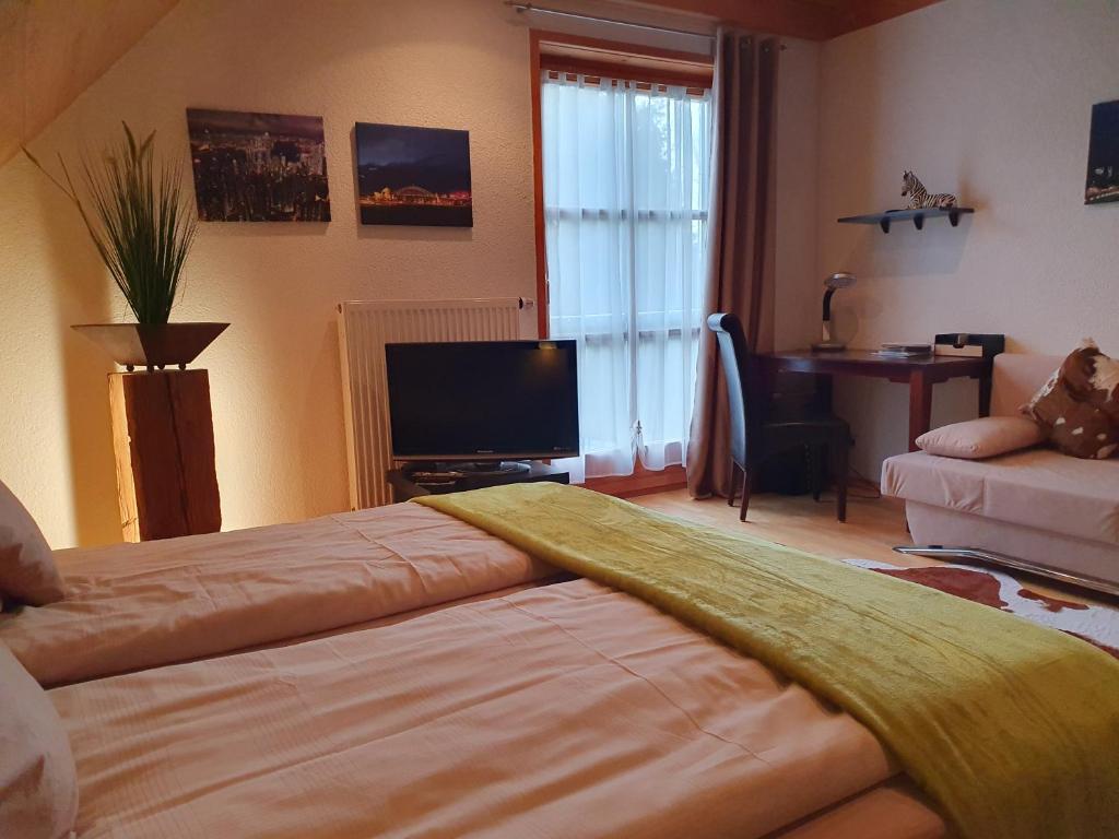 Postel nebo postele na pokoji v ubytování Cornelia Kolpak-Krieger