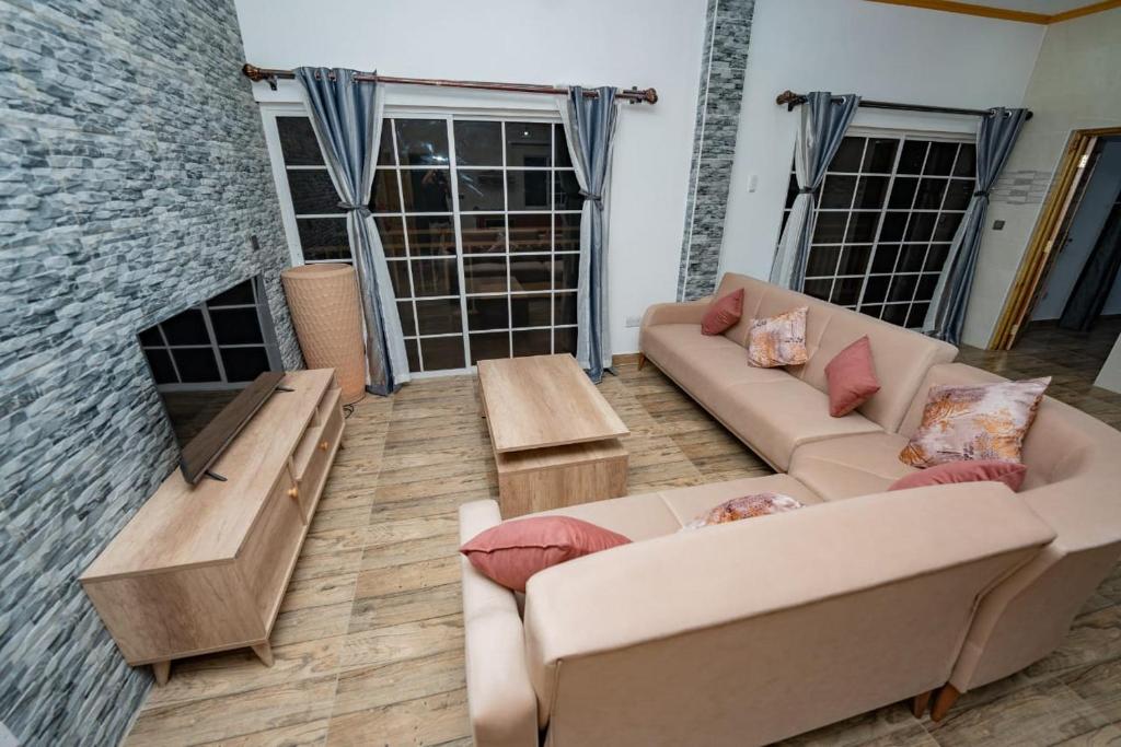 Posezení v ubytování Paradise Breeze Apartment