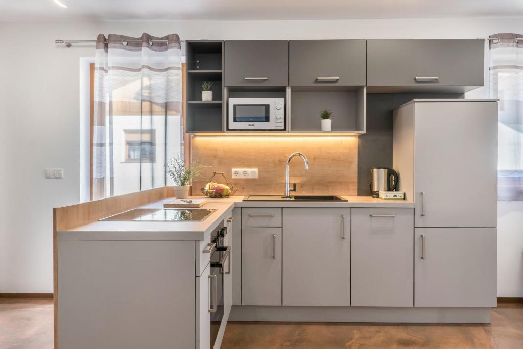 Kuchyňa alebo kuchynka v ubytovaní Trojer Apartment 2