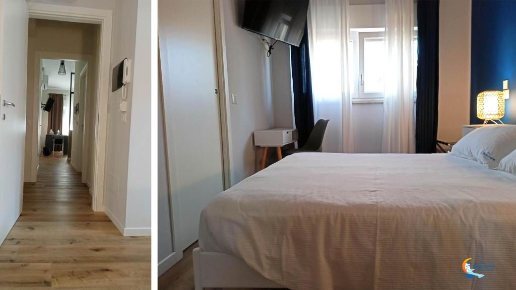 A bed or beds in a room at Baia di Luna