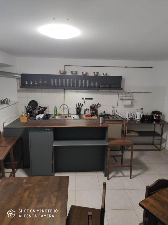 Kuchyň nebo kuchyňský kout v ubytování Centro Hostel
