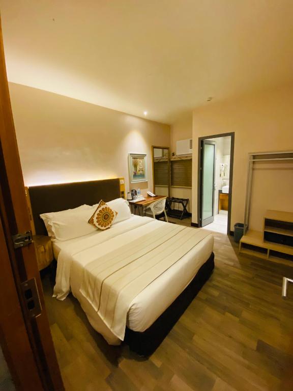 Postel nebo postele na pokoji v ubytování Cuna Hotel