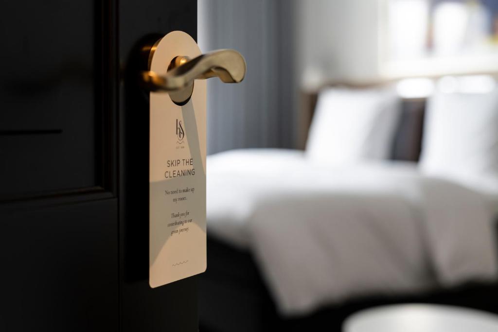Postel nebo postele na pokoji v ubytování Kurhotel Skodsborg