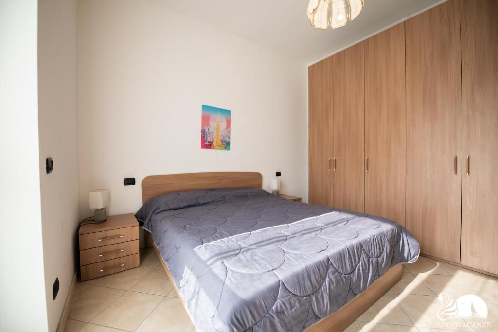 Posteľ alebo postele v izbe v ubytovaní Central Suite Moniga