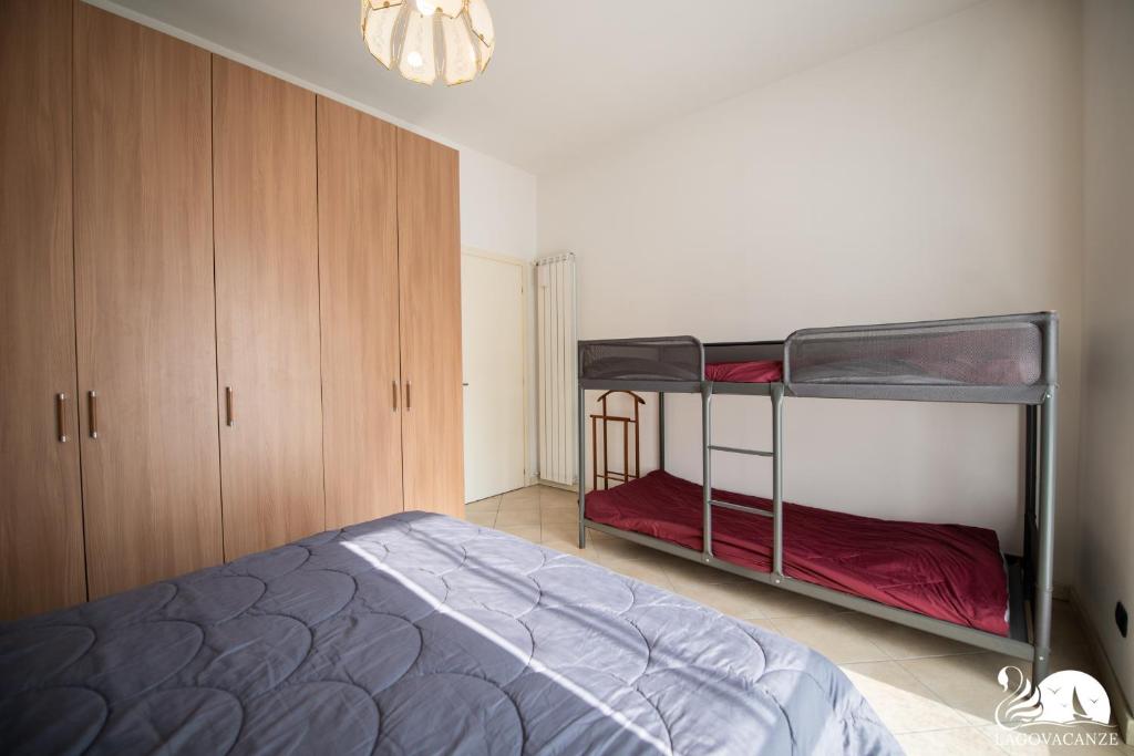 Posteľ alebo postele v izbe v ubytovaní Central Suite Moniga