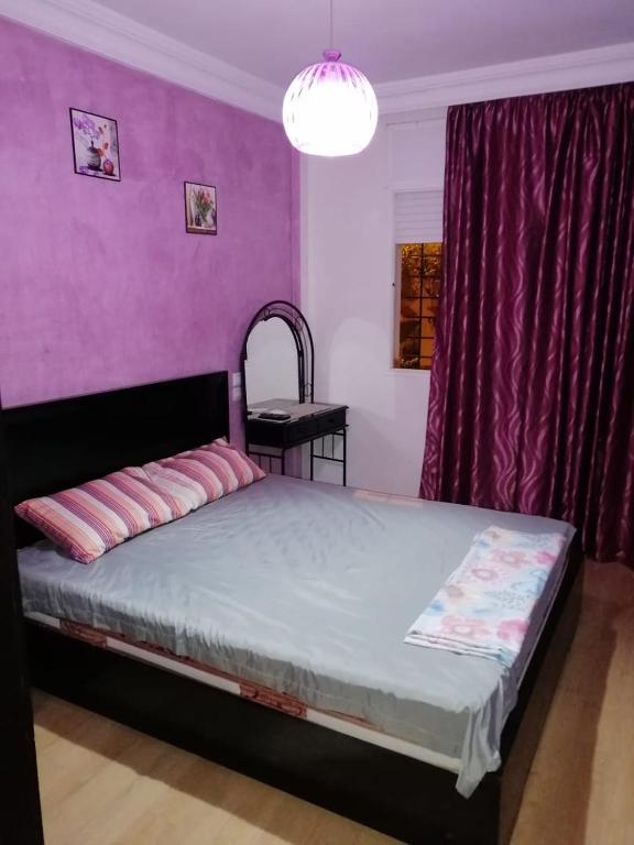 Postel nebo postele na pokoji v ubytování Mohammed V Airport Appartment