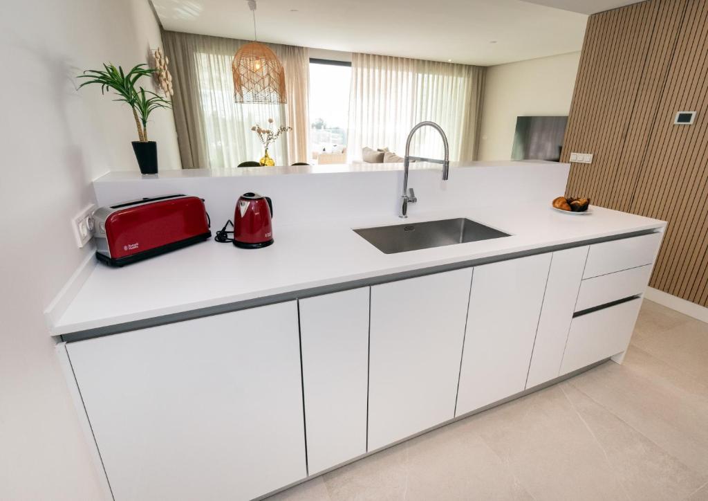 Kuchyňa alebo kuchynka v ubytovaní Marbella Deluxe duplex con piscina privada
