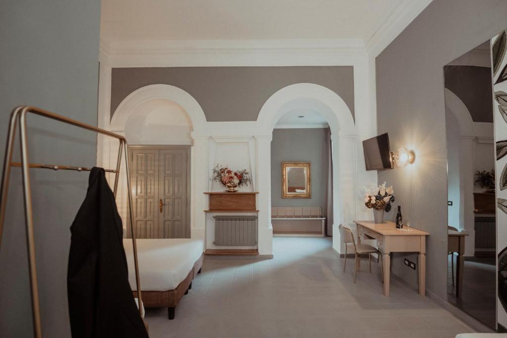 Postel nebo postele na pokoji v ubytování Hotel Marisa
