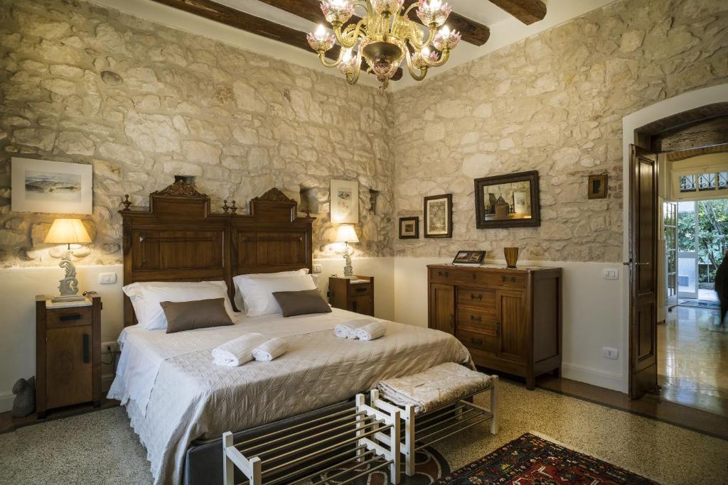 A bed or beds in a room at Il Calamaio