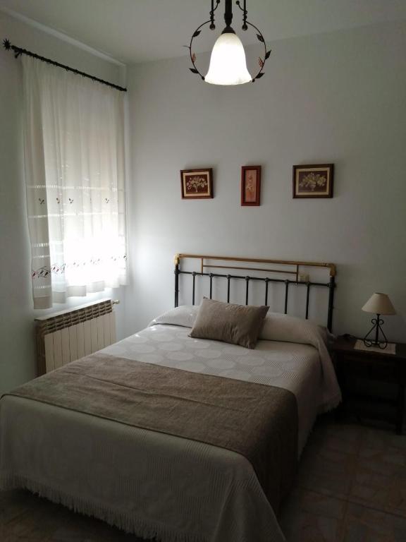 Postel nebo postele na pokoji v ubytování Casa rural Las Erillas