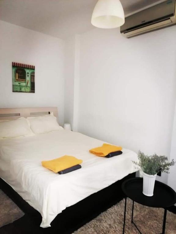 En eller flere senge i et værelse på A G Studio's Palas-Iasi 2