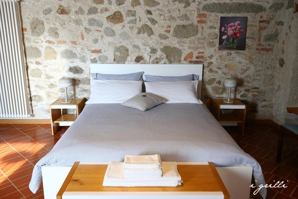 Postel nebo postele na pokoji v ubytování I grilli b&b
