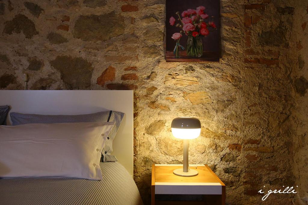 Postel nebo postele na pokoji v ubytování I grilli b&b