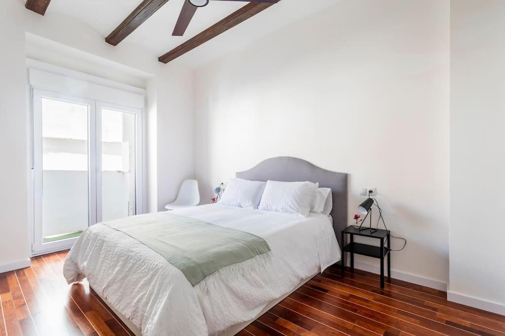 Postel nebo postele na pokoji v ubytování 7P céntrico piso con encanto