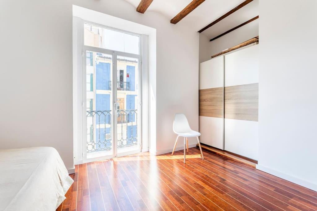 Postel nebo postele na pokoji v ubytování 7P céntrico piso con encanto