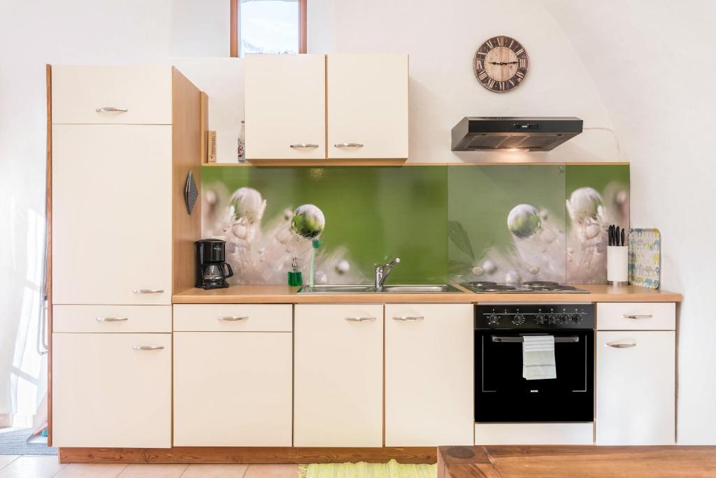 Kuchyň nebo kuchyňský kout v ubytování Moserhof Ferienwohnung Sunnseit