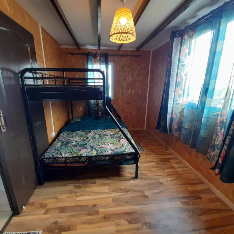 Postel nebo postele na pokoji v ubytování Ty kaz kryst'L