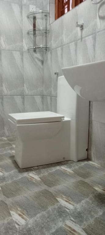 Koupelna v ubytování Thuvaraga Inn