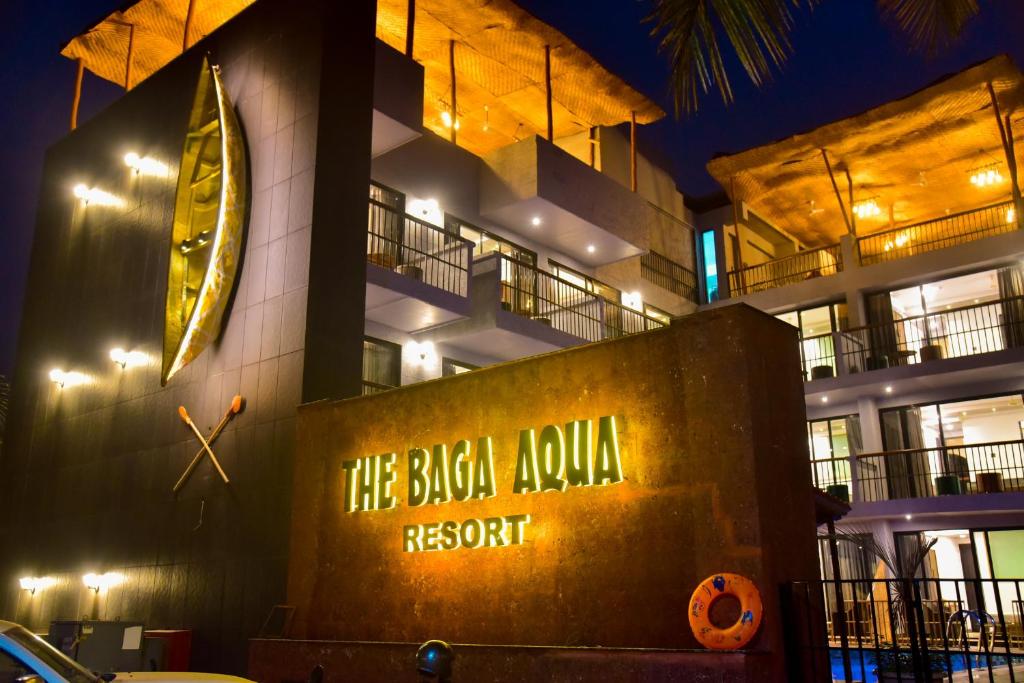 a building with a sign that reads the brazil album resort at Caravan Baga Aqua Resort in Baga