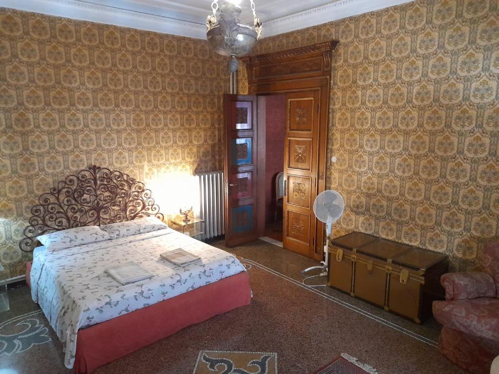 Postel nebo postele na pokoji v ubytování Le Stanze del Notaio