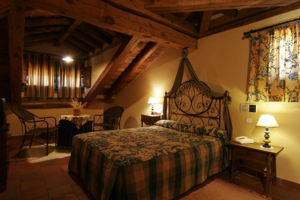 Postel nebo postele na pokoji v ubytování Posada el Zaguan